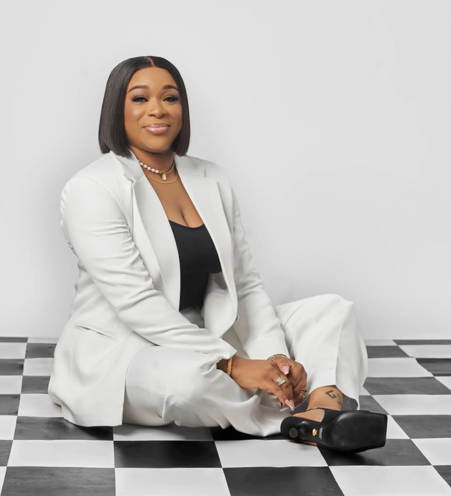 An image of Mabel Richard sitting on the floor